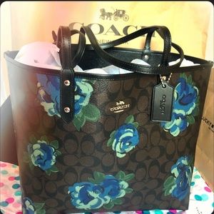 Brand new NWT blue flower coach tote, also reversible to an all black tote!